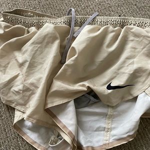 NIKE running gold racing shorts